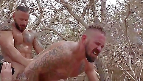 Brunette girl with a tattoo in her mouth receives a deep blowjob