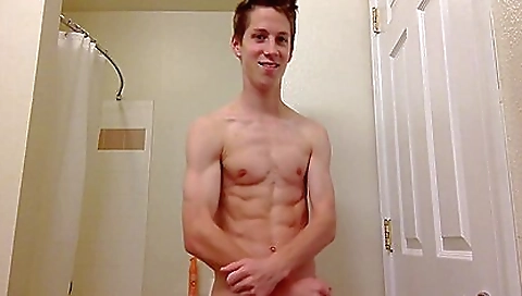 Brunette in black sweater and pink skirt eating a gay dick