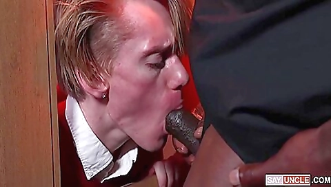 Interracial fuck with an older black priest in a dark booth