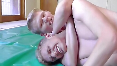 Blonde slut with a sexy face and large tits riding on a guy