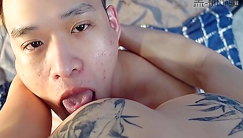 Asian hottie with tattooed pussy sucks dick before riding