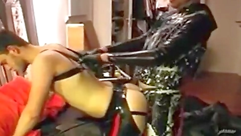Bareback fetish with a rubber mask and a pink mask